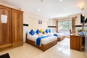 Phòng Bốn Người Có Phòng Tắm Riêng (Quadruple Room with Private Bathroom)