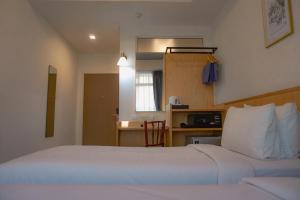 Phòng Hai Giường Đơn Loại Sang (Deluxe Twin Room)