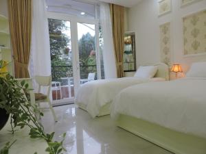 Phòng cho 3 người có Ban Công (Triple Room with Balcony)