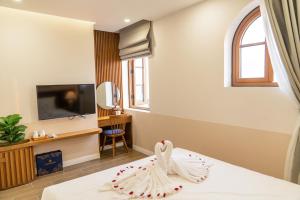 Phòng Deluxe 2 Giường Đơn Nhìn Ra Biển (Deluxe Twin Room with Sea View)
