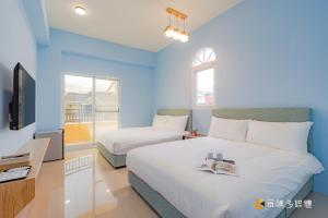 Phòng 4 Người Có Ban Công (Quadruple Room with Balcony)