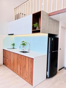 Suite Gác Lửng Ba Người (Mezzanine Triple Suite)