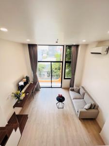 Suite Gác Lửng Ba Người (Mezzanine Triple Suite)
