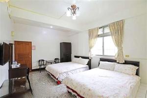 Phòng Bốn Người Có Phòng Tắm Riêng (Quadruple Room with Private Bathroom)