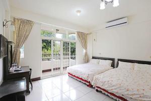 Phòng 4 Người Có Ban Công (Quadruple Room with Balcony)