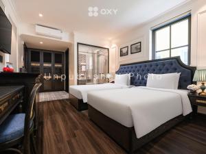 Phòng Đôi hoặc Hai Giường Đơn Loại Sang Hướng Thành Phố (Deluxe Double or Twin Room with City View)
