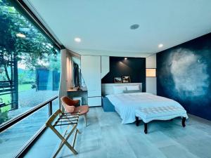 Phòng Có Giường Cỡ Queen Nhìn Ra Vườn (Queen Room with Garden View)