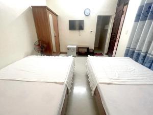 Phòng Bốn Người Có Phòng Tắm Riêng (Quadruple Room with Private Bathroom)
