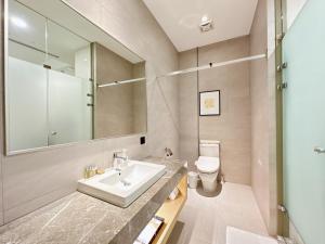 Phòng 2 Giường Đơn Với Chỗ Đỗ Xe - Không Có Cửa Sổ (Twin Room with Parking - No Window)