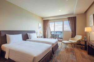 Phòng Hai Giường Đơn Loại Sang (Deluxe Twin Room)