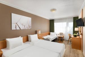 Triple Room room in Danubius Hotel Arena