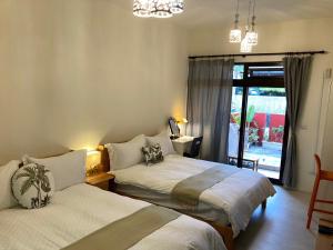 Phòng 4 người nhìn ra vườn (Quadruple Room with Garden View)
