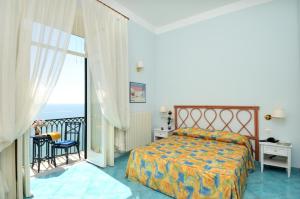 Superior Quadruple Room with Balcony and Sea View room in Villa Maria Luigia