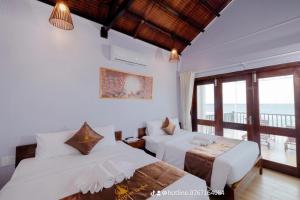 Phòng Có Giường Cỡ King Nhìn Ra Biển (King Room with Sea View)