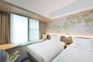 Phòng Hai Giường Đơn Loại Sang (Twin Deluxe Room)