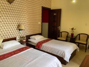 Phòng Hai Giường Đơn Loại Sang (Deluxe Twin Room)