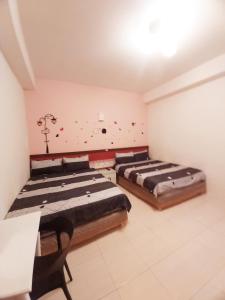 Phòng Tiêu Chuẩn 4 Người (Standard Quadruple Room)