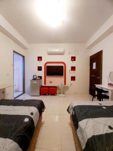 Phòng Tiêu Chuẩn 4 Người (Standard Quadruple Room)