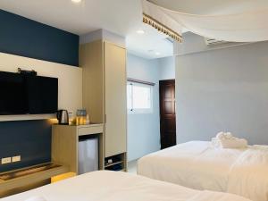 Phòng Deluxe 4 Người (Deluxe Quadruple Room)