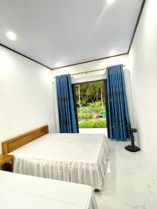 Phòng 2 Giường Đơn Nhìn Ra Khu Vườn (Twin Room with Garden View)
