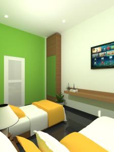 Phòng Hai Giường Đơn Loại Sang (Deluxe Twin Room)