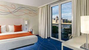 Superior Double Room with River View room in art'otel budapest by park plaza