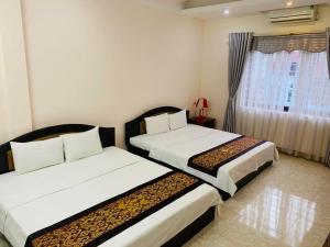 Phòng Deluxe Giường Đôi/2 Giường Đơn (Deluxe Double or Twin Room)