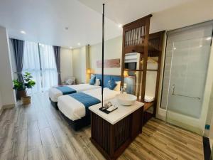 Phòng Deluxe hướng núi giường đôi hoặc 2 giường đơn (Deluxe Double or Twin Room with Mountain View)