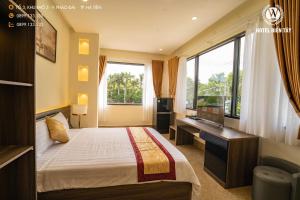 Phòng Giường Đôi Lớn Loại Sang (Deluxe Queen Room)