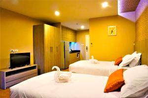 Phòng Hai Giường Đơn Loại Sang (Deluxe Twin Room)