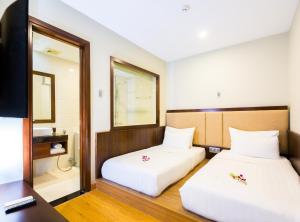 Suite Premier Nhìn ra Biển - 2 Phòng ngủ (Premier Suite with Sea View - Two Bedroom)