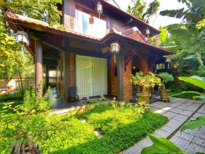 Phòng Tiêu Chuẩn 2 Giường Đơn Nhìn Ra Khu Vườn (Standard Twin Room with Garden View)