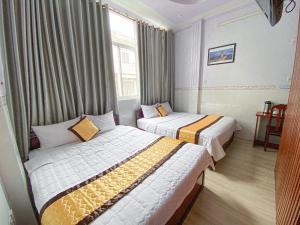 Phòng 4 Người Có Ban Công (Quadruple Room with Balcony)