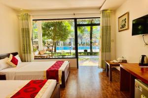 Bungalow Deluxe Nhìn ra Hồ bơi (Deluxe Bungalow with Pool View)