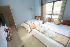 Phòng 2 Giường Đơn Với Phòng Tắm Riêng (Twin Room with Private Bathroom)