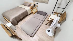 Phòng Đơn Với Phòng Tắm Vòi Sen Và Toilet Chung (Single Room with Shared Shower and Toilet)