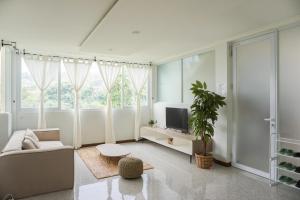 Căn Hộ - Tầng Trệt (Apartment - Ground Floor)