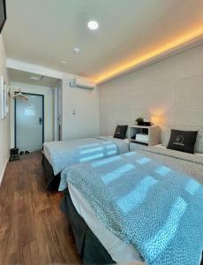 Phòng Hai Giường Đơn Loại Sang (Deluxe Twin Room)