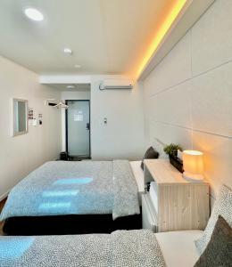 Phòng Hai Giường Đơn Loại Sang (Deluxe Twin Room)