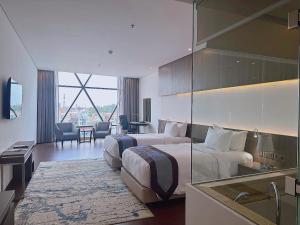 Phòng Đẳng Cấp Hai Giường Đơn (Premier Twin Room)