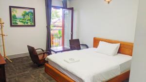 Phòng Deluxe Giường Đôi/2 Giường Đơn Có Ban Công (Deluxe Double or Twin Room with Balcony)
