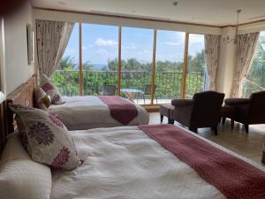Phòng Deluxe 4 Người (Deluxe Quadruple Room)