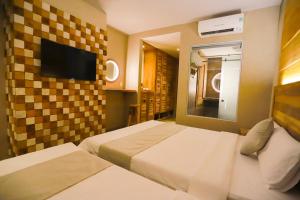Phòng Deluxe hướng biển 2 giường đơn (Deluxe Sea View Twin Room)