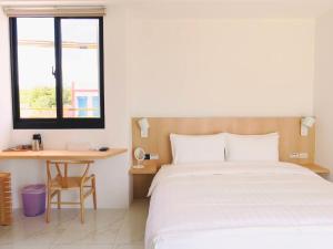 Phòng Deluxe Giường Đôi Nhìn Ra Biển Từ Phía Bên Cạnh (Deluxe Double Room with Side Sea View)