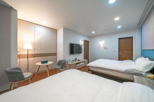 Phòng Tiêu Chuẩn 4 Người (Standard Quadruple Room)