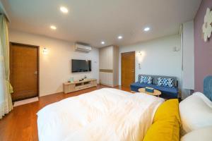 Phòng Deluxe Giường Đôi Có Ban Công (Deluxe Double Room with Balcony)