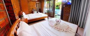 Phòng 4 người nhìn ra vườn (Quadruple Room with Garden View)