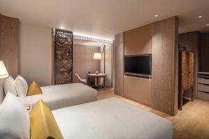 Phòng Deluxe hướng thành phố có 2 giường (Twin Deluxe Room City View)