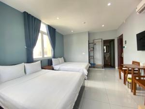 Phòng Tiêu Chuẩn 4 Người (Standard Quadruple Room)