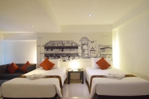 Phòng Hai Giường Đơn Loại Sang (Deluxe Twin Room)